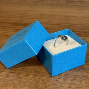 Touchstone Crystal Silver Ring with Dark Stones